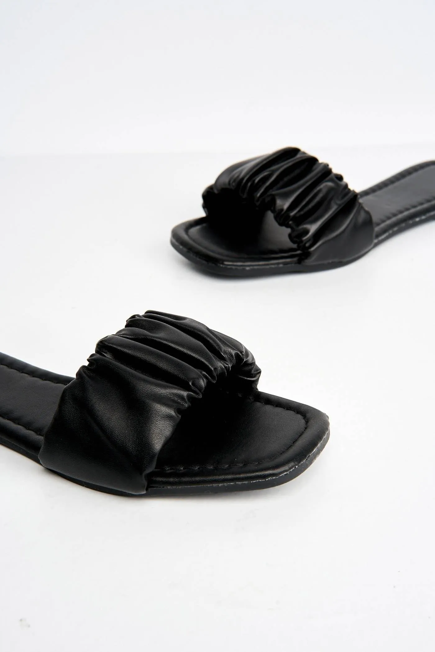 Raye Flat Ruched Sandal in Black