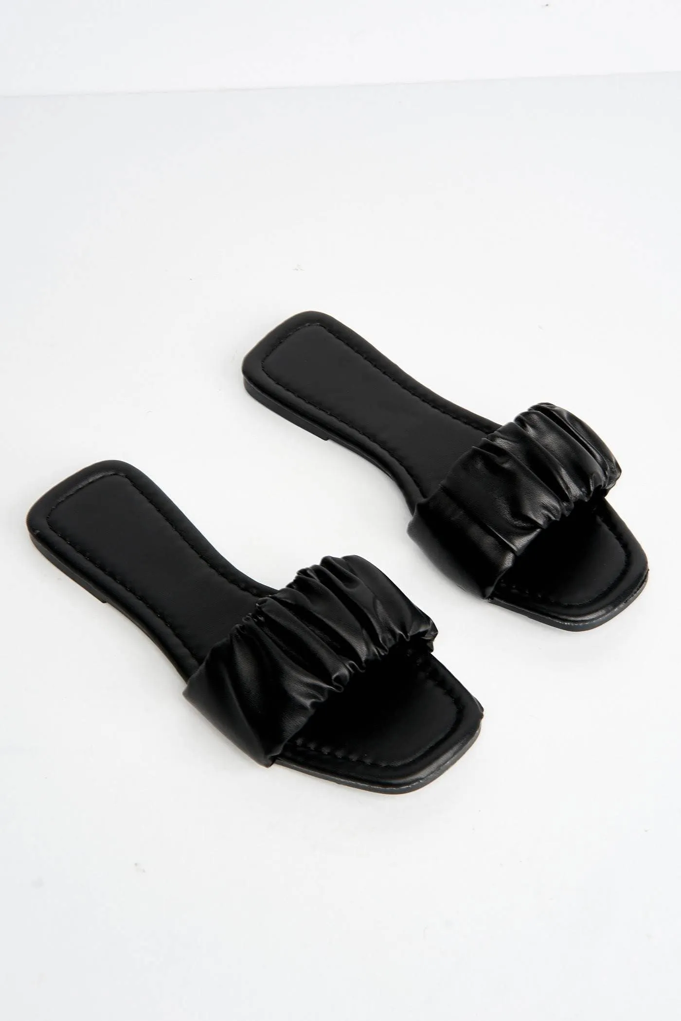 Raye Flat Ruched Sandal in Black